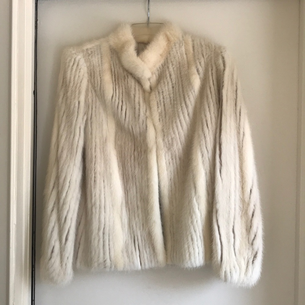Beautiful white rabbit fur coat. Size medium.